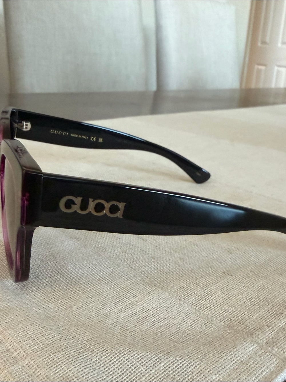 Gucci Black Cat-Eye Sunglasses with Pink Accents - Picture 3 of 6